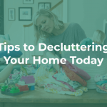 woman in living room folding clothes and cleaning up kids toys, children playing